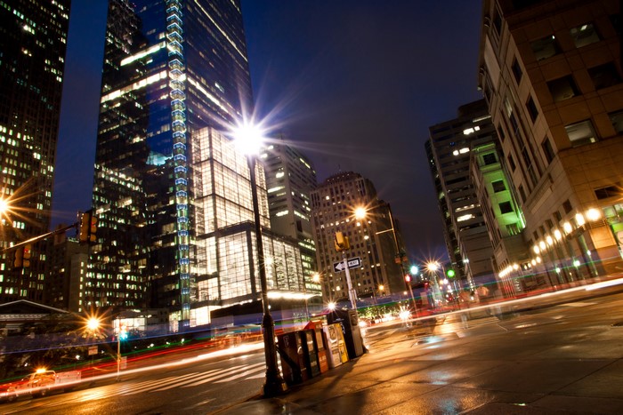 Night street view of Philadelphia skyscrapers with light trails