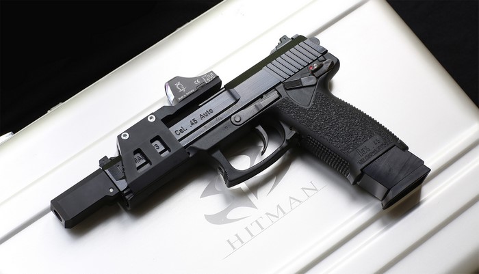 Heckler & Koch USP Tactical .45 Auto pistol with red dot sight