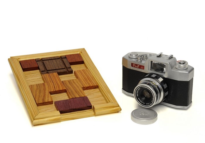 Pax Jr camera and wooden puzzle