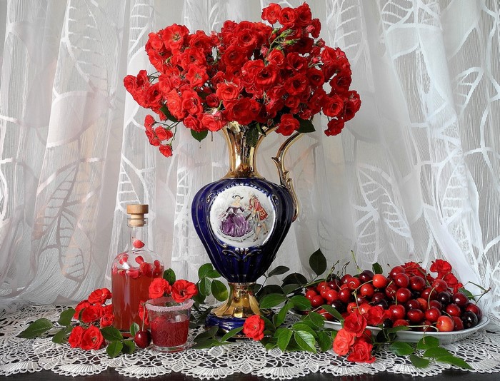Still life with roses, cherries, vase, bottle, and glass