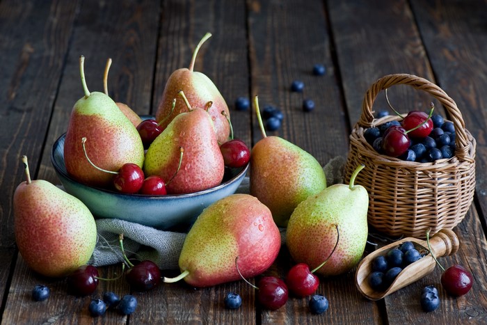 Pears, Cherries, and Blueberries in a Wicker Basket