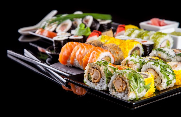 Sushi platter with salmon and various rolls