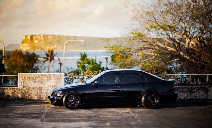 Black Lexus IS200 parked outdoors