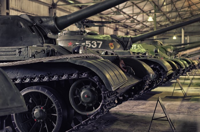 Tanks lined up in a hangar
