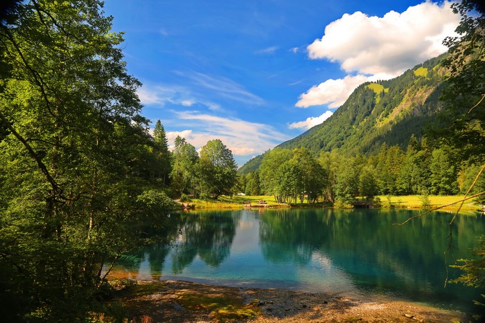 Lake and Mountains with Forest and Blue Sky