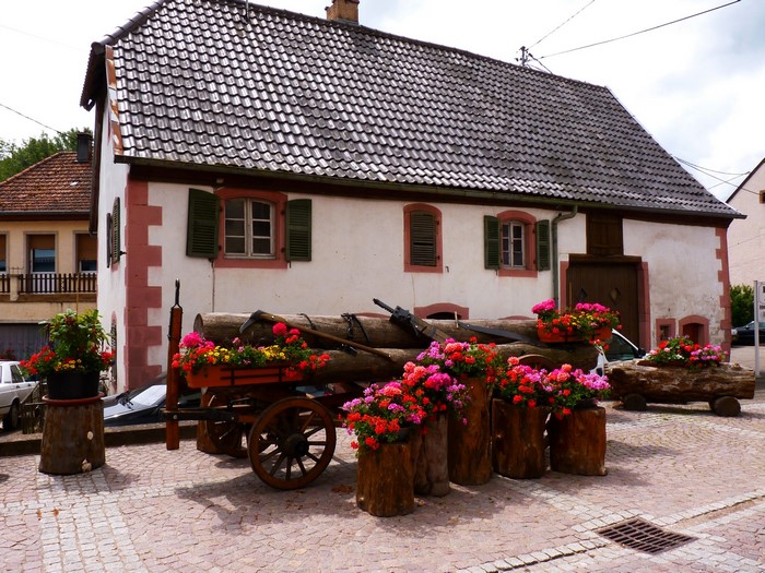 House with flower decorations in Oberhaslach, France