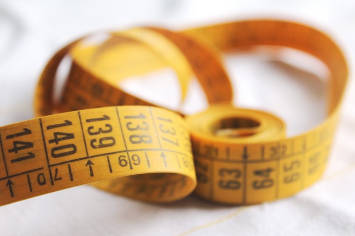 Yellow measuring tape ribbon