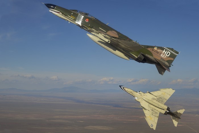 Two McDonnell Douglas F-4E Phantom fighter jets in flight