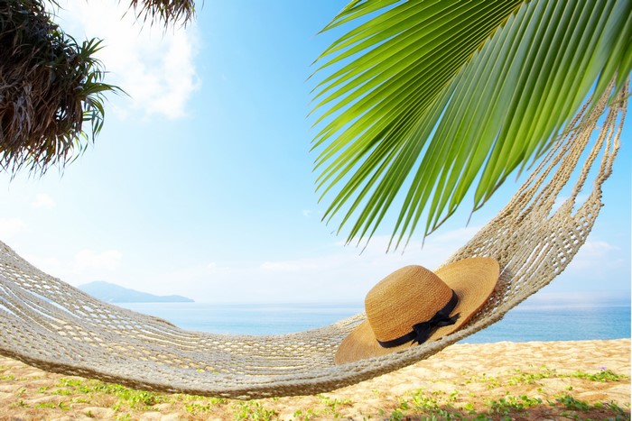 Hammock with Hat on a Tropical Beach