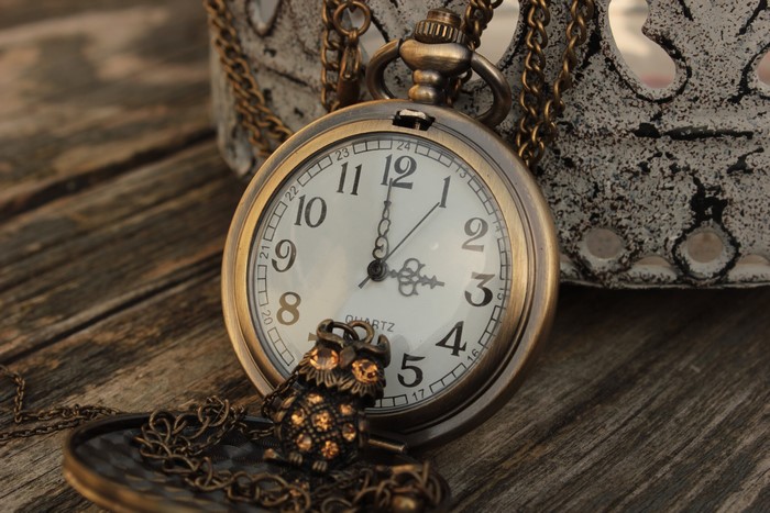 Pocket watch with owl charm
