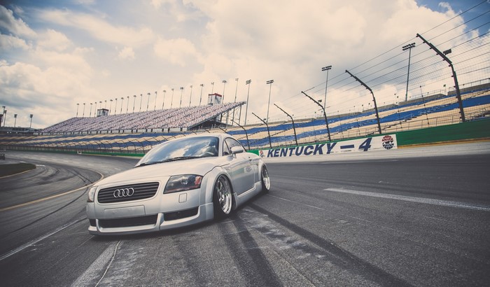 Silver Audi TT on Kentucky Speedway track