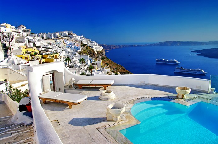 Santorini Greece White Houses and Blue Ocean with Cruise Ships