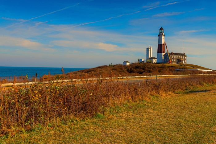 Montauk Point Lighthouse on a hill by the sea