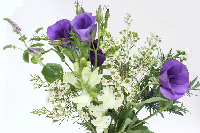 Bouquets of Eustoma, Hellebore, and Antirrhinum flowers