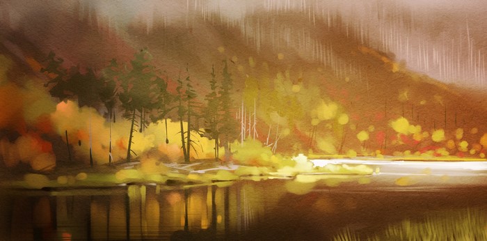 Autumn forest by a river with reflections