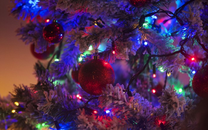 Close-up of a decorated Christmas tree with lights and ornaments