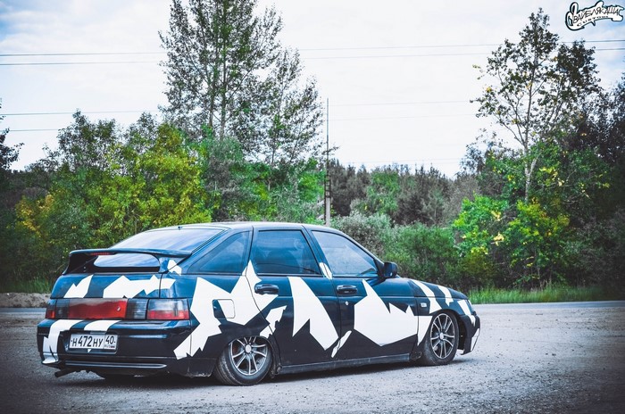 Tuned black Vaz 2112 with white graphics