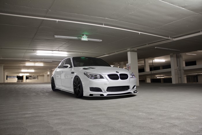 White BMW M5 E60 in Parking Garage