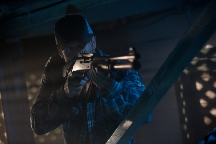 Phil Broker from Homefront with a shotgun