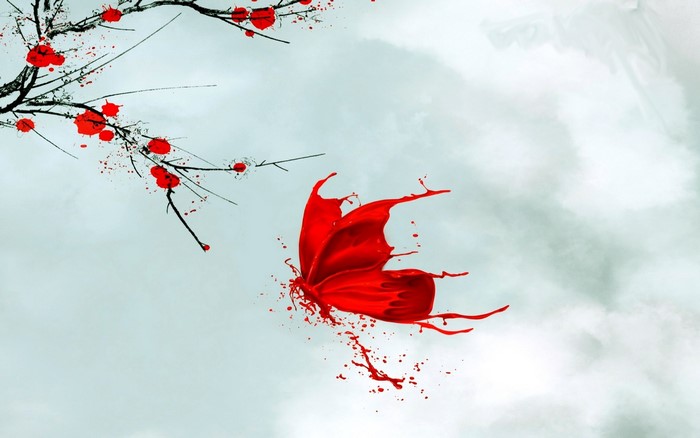 Red paint butterfly and branches with red dots
