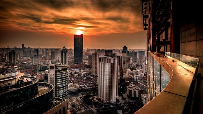 Shanghai cityscape at sunset with skyscrapers