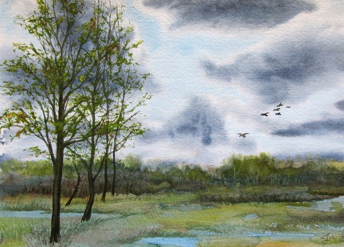 Watercolor painting of trees and a stormy sky with birds