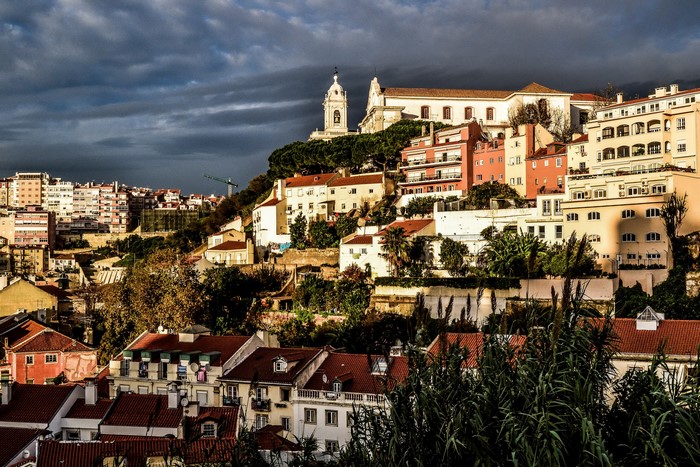 Lisbon cityscape with church on hill