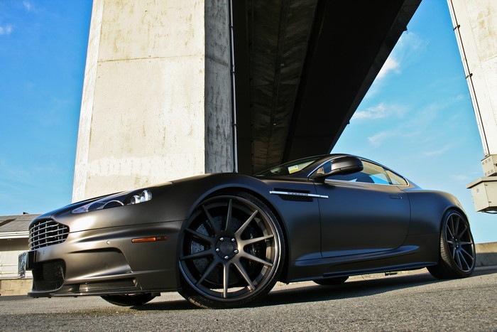 Aston Martin DBS under a bridge