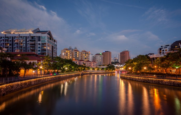 Singapore River at dusk with city skyline