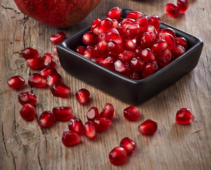 Pomegranate seeds in a bowl