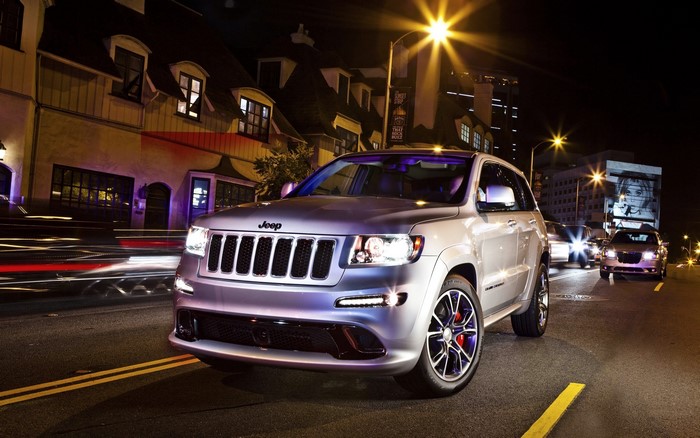 Jeep Cherokee SRT8 on a city street at night