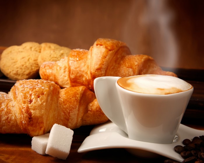 Croissants and Cappuccino with Sugar Cubes