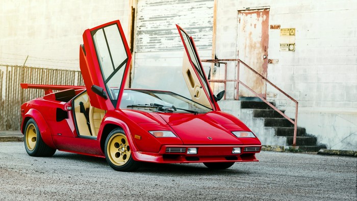 Red 1982 Lamborghini Countach LP5000 S Bertone with doors open