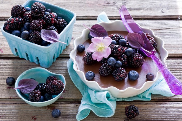 Chocolate dessert with blackberries and blueberries