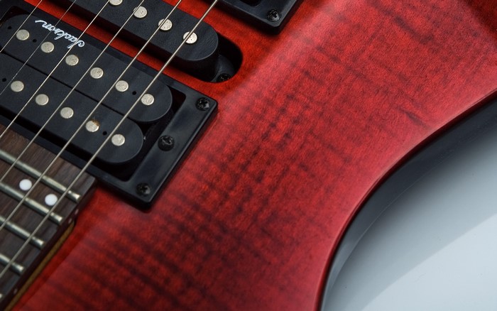 Red Jackson electric guitar close-up