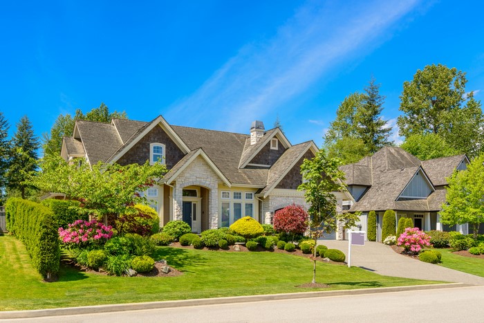 Beautifully landscaped houses on a sunny day