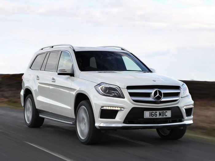 White Mercedes-Benz GL 350 BlueTec AMG Sports Package driving