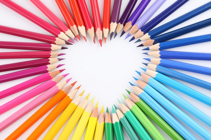 Heart shape made of colored pencils