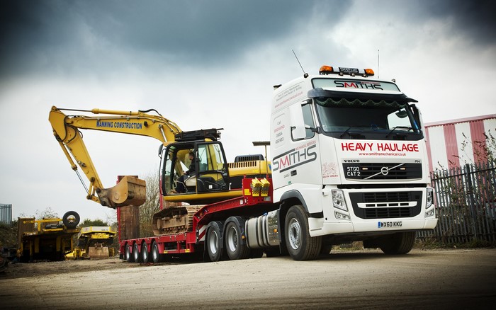 Volvo Heavy Haulage Truck carrying excavator