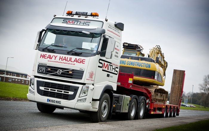 Volvo FH Heavy Haulage Truck carrying Excavator