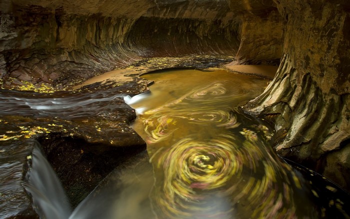 River flowing through a sandstone cave