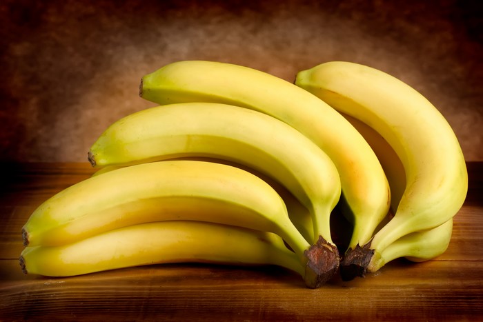 Bananas on a wooden surface