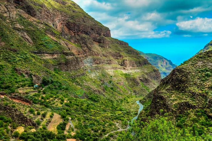 Mountain valley with river and ocean view in Canary Islands, Spain