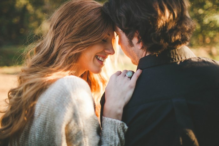 Couple embracing outdoors