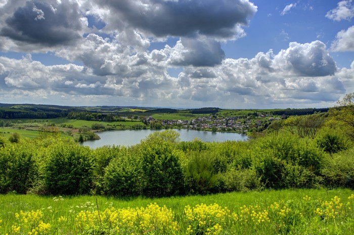 Ellscheid, Germany: Lake and Village with Rolling Hills
