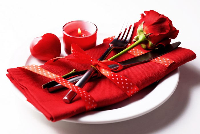 Valentine's Day table setting with rose and candle