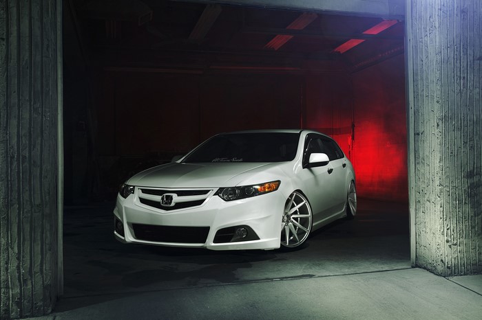 White Acura TSX in a garage