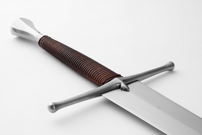 Close-up of a medieval sword hilt and blade