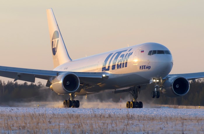 UTair Boeing 767-224 ER landing on a snowy runway