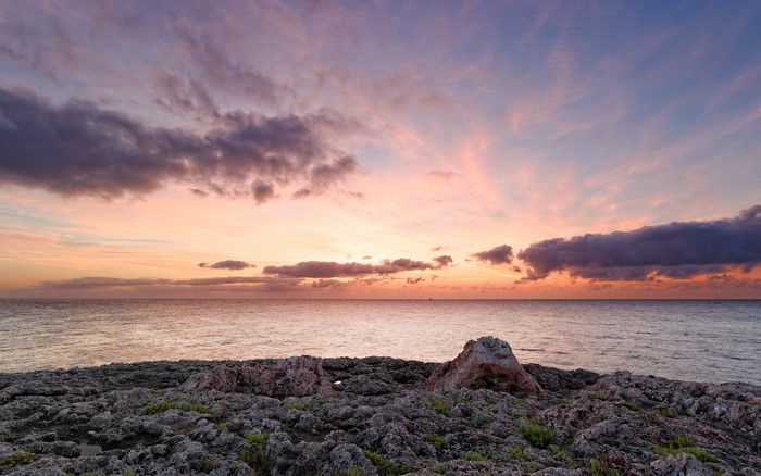 Rocky coast at sunrise over the sea in Balearic Islands